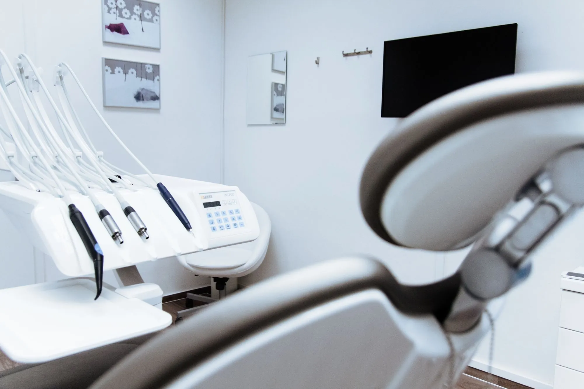 Modern dental treatment room in a clean clinic, medical practice insurance